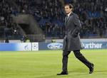 AC Milan's head coach Massimiliano Allegri walks at the pitch prior the UEFA Champions League, group C, soccer match, between AC Milan and Zenit St. Petersburg in St.Petersburg, Russia, Wednesday, Oct. 3, 2012.