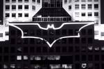 The bat-signal projected against the Fifth Avenue Place during filming in Pittsburgh. Viral marketing campaigns for the film continued as magazine companies Empire and Wired received 