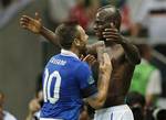 Italy's Mario Balotelli is congratuled by Antonio Cassano after scoring his second goal during the Euro 2012 soccer championship semifinal match between Germany and Italy in Warsaw, Poland, Thursday, June 28, 2012.