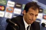 AC Milan's coach Massimiliano Allegri looks on during a press conference in Auxerre, central France, Monday, Nov. 22, 2010. AC Milan will face Auxerre in a Champion League soccer match on Tuesday.