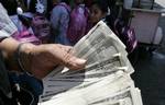 A Palestinian man exchanges currency, in the in city of Rafah the southern Gaza Strip, the U.S. dollar and shekel in black markets in the Gaza Strip on Sep. 20, 2011. Significant increase to the U.S. dollar $1000 against Israel 3.63. shekel in the Palestinian territories, the first time in five years, gets high for the dollar a due to protests in Israel, analysts said economy Palestinian. ( Photo by Ahmed Deeb/WN)