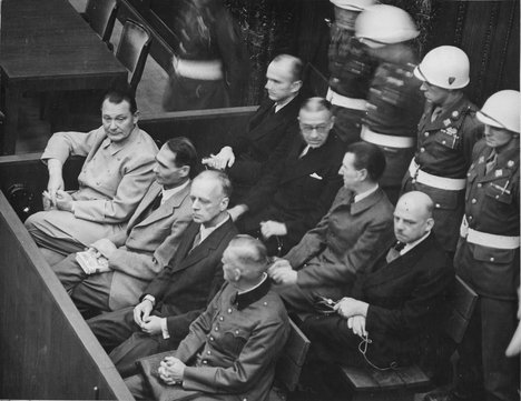 File - Nuremberg Trials. Defendants in their dock, circa 1945-1946. (in front row, from left to right): Hermann Göring, Rudolf Hess, Joachim von Ribbentrop, Wilhelm Keitel