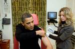 A White House nurse prepares to administer the H1N1 vaccine to President Barack Obama at the White House on Sunday, Dec. 20, 2009.