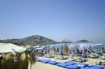 View of Kuşadası from the beach. Kuşadası (pronounced [ˈkuʃadasɯ]) is a resort town on Turkey's Aegean coast and the center of the seaside district of the same name in Aydın Province.