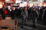 Security guards on a shopping center entrance. Verdun is Lebanon's Answer to 