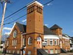 First Christian Church, a part of the district. In 1996, almost the entire community was listed on the National Register of Historic Places as a historic district