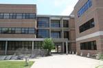 Liquid Crystal Research Building at Kent State University from Science Mall.There have been four directors of the Liquid Crystal Institute.