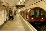 A Central line train at Lancaster Gate.The London Underground (also known as The Tube or The Underground) is a rapid transit system serving a large part of Greater London and some parts of Buckingham shire, Hertfordshire and Essex in England.