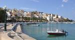 View of the marina. The earliest settlement of the town dates back to before Minoan times; excavations in the neighboring site of Petras have unearthed architectural remains that date back to the end of the Neolithic period 3000 BC and continue throughout the Bronze Age 3000-1050 BC.