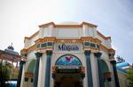 The entrance for The Little Mermaid: Ariel's Undersea Adventure. The Orange Stinger closed on July 14, 2009, and was rethemed as Silly Symphony Swings, based on Walt Disney's classic cartoon, 