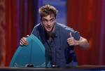 Actor Robert Pattinson accepts the Choice Drama Movie Actor award at the Teen Choice Awards on Sunday, Aug. 8, 2010 in Universal City, Calif.