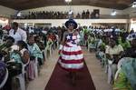 Liberian women gather in Paynesville, a district of Monrovia, Liberia, to attend a thanksgiving event in honor of Ellen Johnson Sirleaf, President of Liberia, Wednesday 17 October, 2012. The event was supported by the Ministry of Gender and Development, along with UNWomen. UNMIL Photo/Staton Winter