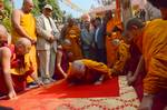 Tibetan Buddhism in India: His Holiness the 14th Dalai Lama, Tibetan spiritual leader prostrating on his arrival at the Mahabodhi temple in Bodhgaya on December 31, 2011.