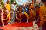 Buddhism: His Holiness the 14th Dalai Lama, Tibetan spiritual leader prostrating on his arrival at the Mahabodhi temple in Bodhgaya on December 31, 2011.