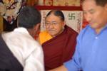 Buddhism in exile: Devotees receiving blesses from the head of Sakya Buddhist sect, Dharamshala, India