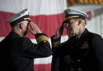 Capt. Kent D. Whalen, right, relieves Capt. Bruce H. Lindsey as the commanding officer of the Nimitz-class aircraft carrier USS Carl Vinson (CVN 70).