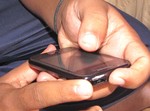 A smartphone in boy's hand - Worldwide Smartphone use increased