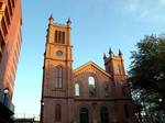 Looking south from Jamaica Avenue at First Reformed Church of Jamaica at dusk of a sunny day. NYC LPC designation 1966