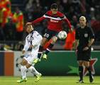 Lille's forward Eden Hazard of Belgium, center, controls the ball during his Champions League soccer match, Group B, at Lille Metropole Stadium in Villeneuve d'Ascq, Tuesday, Oct 18, 2011.