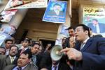 Former Egyptian opposition leader Ayman Nour, right, who was released last week after nearly four years in prison following his challenge to the country's longtime President in the 2005 elections, speaks to lawyers during their protest against increased litigation fees, at the lawyers' syndicate in downtown Cairo