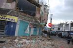 A building is seen damaged by earthquake in the town of Tasikmalaya, West Java, Indonesia, Wednesday, Sept. 2, 2009.