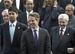 From center counter clock wise, U.S. Treasury Secretary Timothy Geithner, European Central Bank President Jean-Claude Trichet, India Finance Minister Pranab Mukherjee, India Cnetral Bank Governor Duvvuri Subba Rao, Japan Central Bank Governor Masaaki Shirakawa, and U.S. Federal Reserve Governor Kevin Warsh arrive for a group photo session of the G20 Finance Ministers and Central Bank Governors Meeting in Busan, South Korea Friday, June 4, 2010.