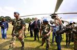 Alain Le Roy (centre, red tie), Under-Secretary-General for Peacekeeping Operations, arrives in Abidjan, Côte d’Ivoire, to visit UN troops providing security at the Hotel Golf, where Côte d’Ivoire’s recently elected president, Alassane Ouattara, and his prime minister, Guillaume Soro, are residing while former President Laurent Gbagbo refuses to step down.