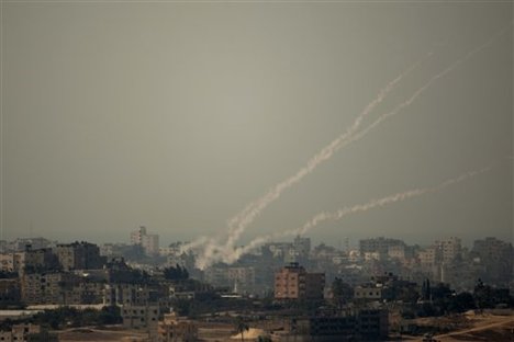 Smoke trails of rocket fired by Palestinian militants from Gaza Strip towards Israel, Wednesday, Oct. 24, 2012.