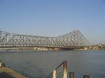 The Howrah Bridge is a bridge that spans the Hooghly River in West Bengal, India. It was originally named the New Howrah Bridge because it links the city of Howrah to its twin city, Kolkata (Calcutta). On 14 June 1965 it was renamed Rabindra Setu, after Rabindranath Tagore a great poet and the first Indian Nobel laureate. However it is still popularly known as the Howrah Bridge. The bridge is one of the four on the Hooghly River and is a famous symbol of Kolkata and West Bengal. The other bridge