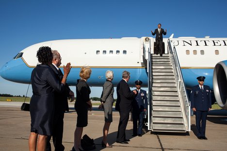 File - President Barack Obama disembarks Air Force One upon arrival at Joplin Regional Airport in Joplin, Missouri, May 21, 2012.