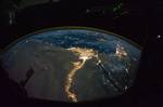 The Nile River Delta at night or nighttime is the period of time between the sunset and the sunrise when the Sun is below the horizon. This occurs after dusk. The opposite of night is day (or 