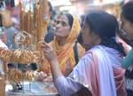 Kashmiri shoppers at a market ahead of the Eid al-Adha festival in Srinagar on October24, 2012. Muslims around the world celebrate Eid al-Adha by slaughtering sheep, goats and cattle to commemorate Prophet Abraham's willingness to sacrifice his son, Ismail, on God's command. Eid al-Adha will be celebrated on October 27, in Kashmir.