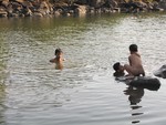 Swimming in a river - outdoor activity - outing in the nature