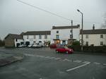 Dullage- The row of shops at the Frampton End Road/Church Road junction, believed to be the site of a Roman settlement in the village