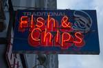 A Neon sign for Fish and Chips in London. The long-standing Roman Catholic tradition of not eating meat on Fridays - especially during Lent - and of substituting fish for other types of meat on that day - continues to influence habits even in predominantly Protestant, semi-secular and secular societies.