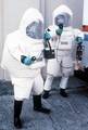 Members of a Coast Guard hazardous materials strike team prepare to measure levels of oxygen. U.S. COAST GUARD PHOTO (108421) ( ENVIRONMENTAL RESPONSE (FOR RELEASE) )