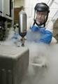 Machinist's Mate 2nd Class John Burge, from Alpharetta, Ga., collects liquid oxygen samples in the forward O2N2 plant aboard the Nimitz-class aircraft carrier USS John C. Stennis (CVN 74).