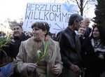 File - Refugees from Iraq arrive at the transit camp in Friedland, central Germany, Thursday, March 19, 2009.