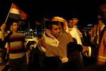 Egyptian released prisoners from Israeli jails , Abdullah Salman, meets his relatives upon his arrival to Egypt at the Taba border crossing in the south of Egypt's Sinai Peninsula, Thursday, Oct. 27, 2011.