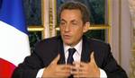 French President Nicolas Sarkozy speaks during a TV interview at the Elysee Palace in Paris in this image taken from TV Thursday Oct. 27, 2011.