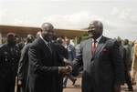 Ivory Coast President Laurent Gbagbo, Left, welcome Sierra Leone, President, Ernest Bai Koroma, at the Presidential Palace in Abidjan, Ivory Coast, Tuesday, Dec. 28, 2010. A delegation of West African leaders, including Sierra Leone's Bai Koroma and Benin President Boni Yayi, is gathering in Abidjan on Tuesday, to demand that Laurent Gbagbo steps down from the presidency before he is forced out. Gbagbo maintains control of Ivory Coast's military and security forces despite losing the recent elec