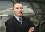 Willie Walsh, CEO of British Airways, poses for photographs in Terminal 7 at JFK International Airport on Wednesday, May 21, 2008 in New York.