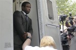 City trader Kweku Adoboli, arrivies at City of London Magistrates' Court in London Thursday Sept. 22, 2011, where he is accused of fraud and two charges of false accounting over three years at Swiss banking giant UBS.