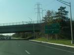 I-95 southbound at CR 583 exit in Lawrence Township. The New Jersey segment of I-95 north of Trenton, officially numbered as Route 95M by the New Jersey Department of Transportation, begins at the Scudder Falls Bridge over the Delaware River in Ewing Township, Mercer County.