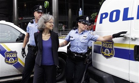 Green Party presidential nominee Jill Stein, is transported in restraints to be arrested after a sit-in at a downtown Philadelphia bank over housing foreclosures.