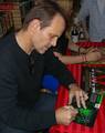 Star Michael Biehn signing a copy of the film's DVD cover during an August 23, 2012 appearance at Midtown Comics in Manhattan.