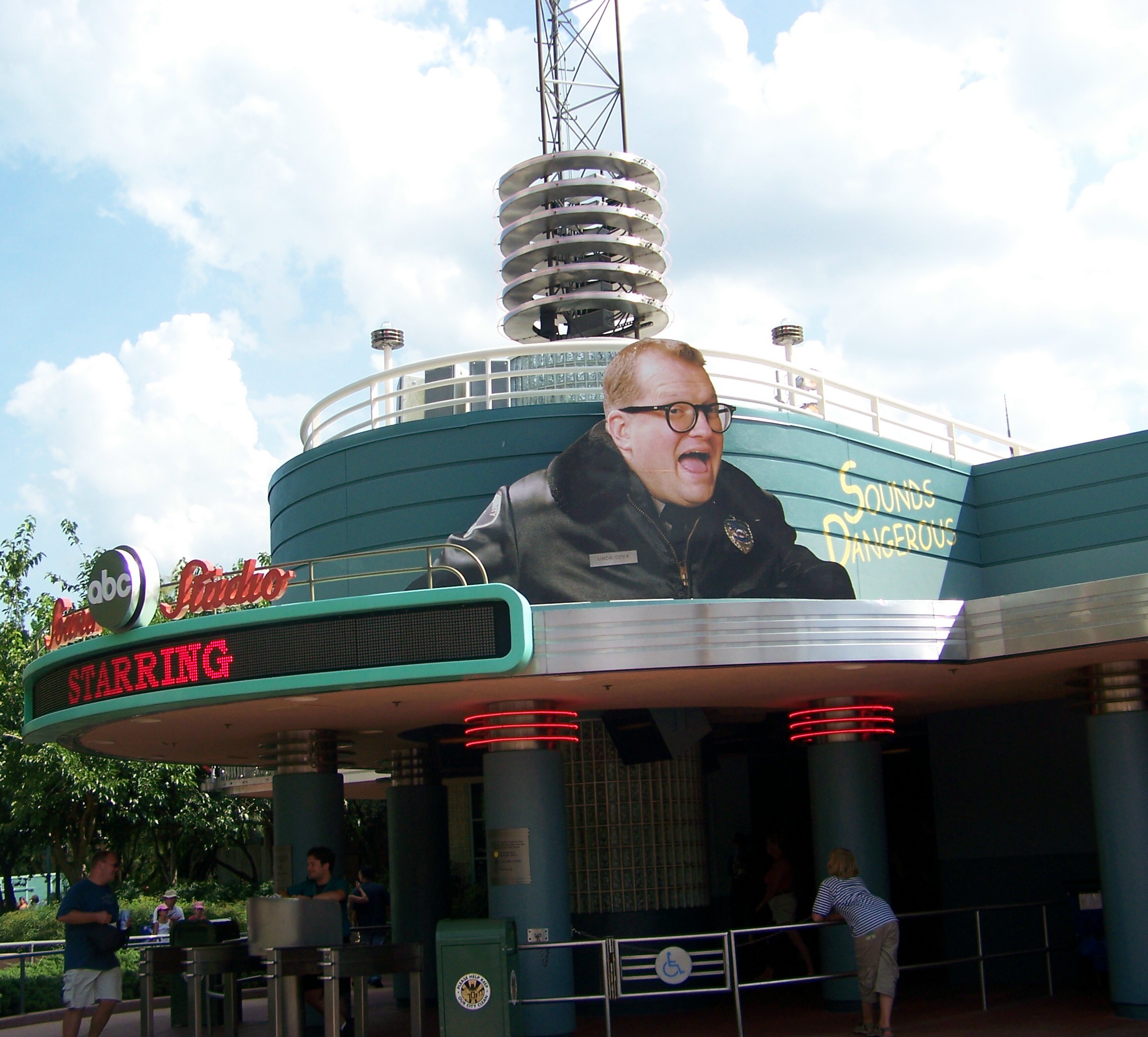 Larger than life figure of Carey's head and shoulders, posted above the studio entrance.