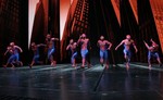 Spider-Men move across the stage during the curtain call for "Spider-Man: Turn Off The Dark" following the first preview performance of the revamped show at the Foxwoods Theatre in New York Thursday May 12, 2011.