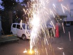 People burning crackers in the Diwali festival in India