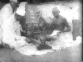 Gandhi using a Spinning Wheel in India - Gandhi video footage